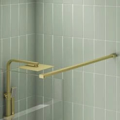 Harbour I8 Brushed Brass 8mm Glass Screen For Walk In Showers And Wetrooms -Drench Store scudo brushed brass single walkin wetroom panel supportarm detail lifestyle
